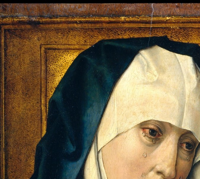 Red-rimmed eyes and wet cheeks make grief instantly legible; the gaze downward avoids the viewer, deepening the private quality of sorrow