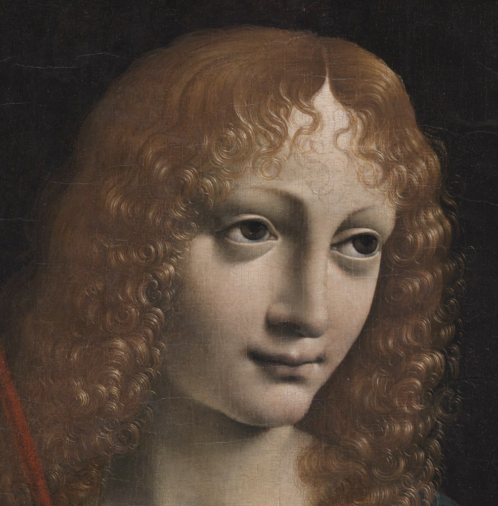 But the face is not a generic saint. It is a real person.