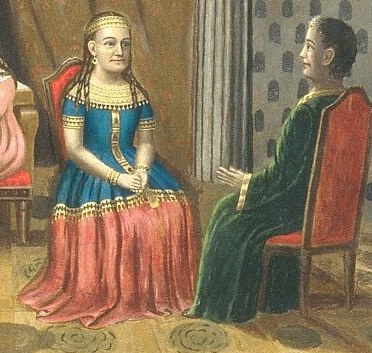 Here, a man and two women gather with children and an infant.