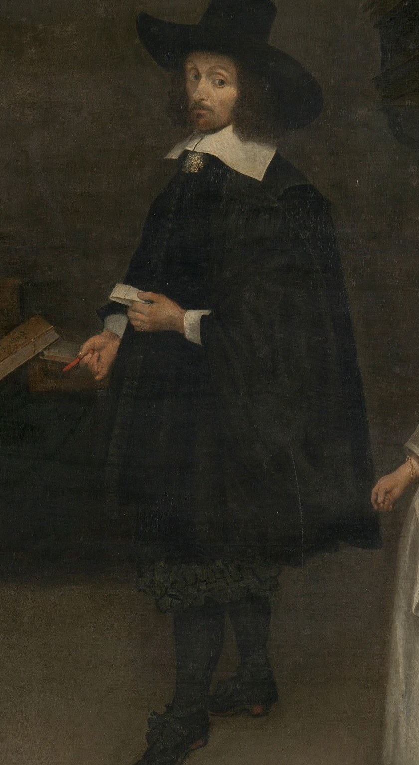 The man holds a document, a common sign of his authority and status.