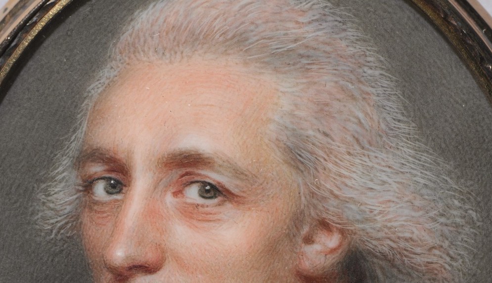 Notice the powdered hair, a distinct fashion of the late 18th century.