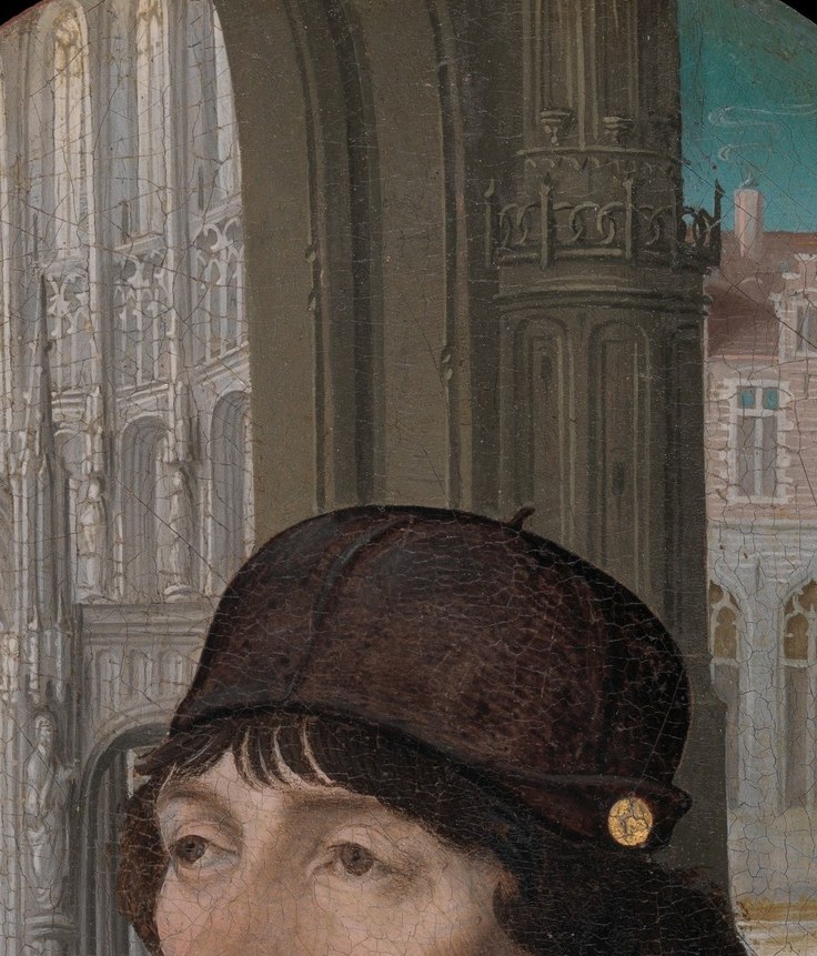 A young man in dark merchant's wool.