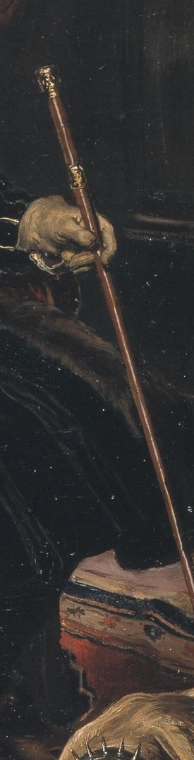 Christian holds his staff like a scepter.