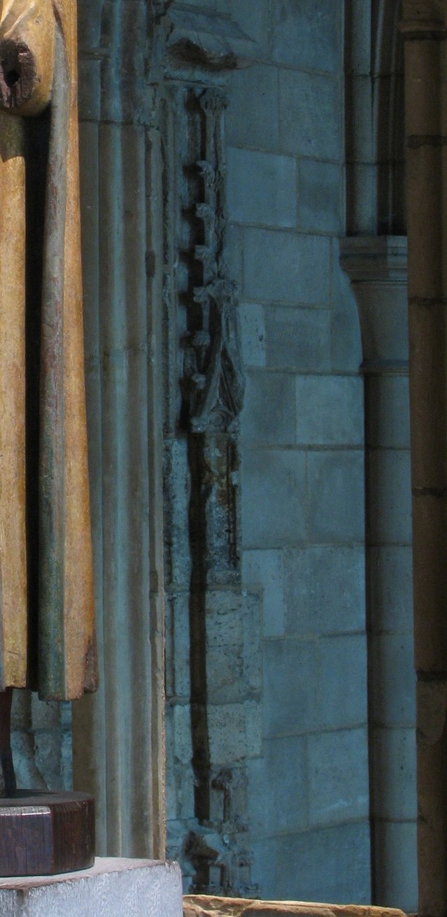 These create a dramatic contrast, making the illuminated figure appear more prominent and ethereal.