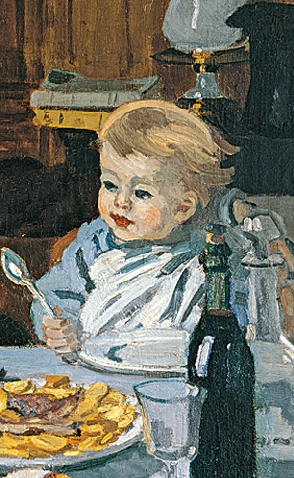 The child's focus on the spoon and food highlights the domesticity and everyday nature of the meal.