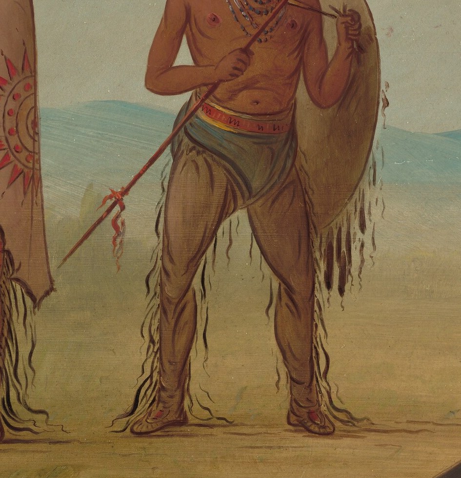 A warrior stands ready, his spear held lightly.