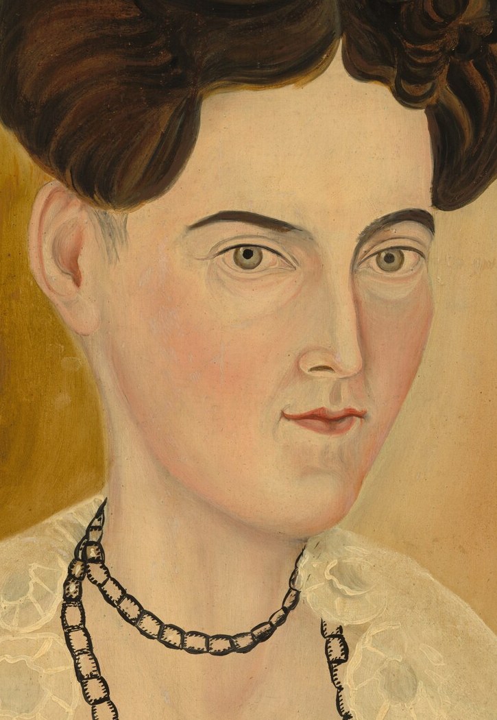 Her direct gaze invites you to consider her thoughtful, quiet introspection.