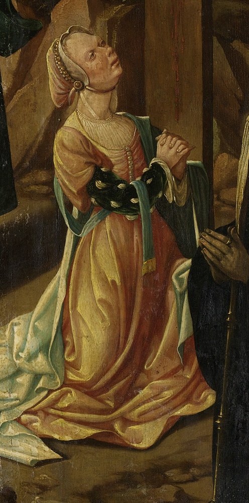 Mary Magdalene, overcome, kneels at the cross's base.