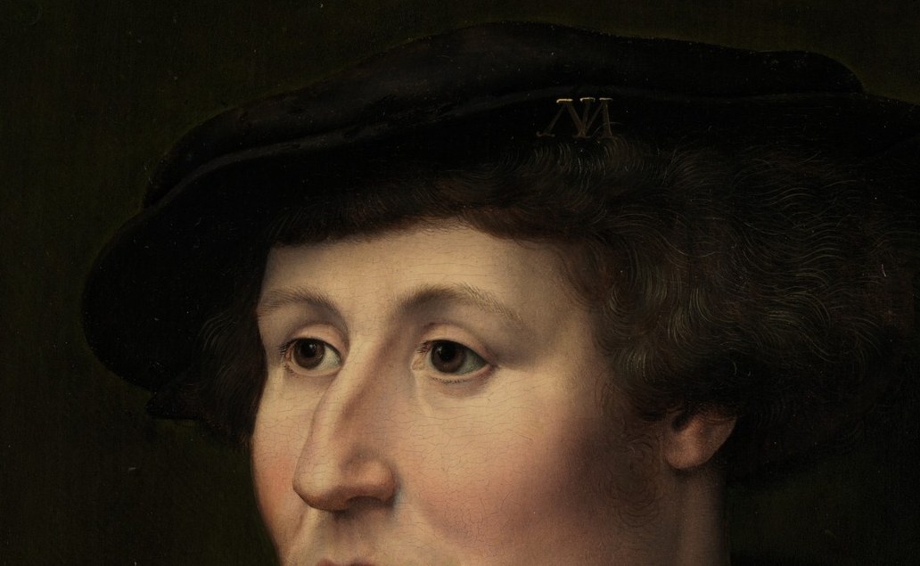The hat has a subtle emblem, hinting at status or affiliation.