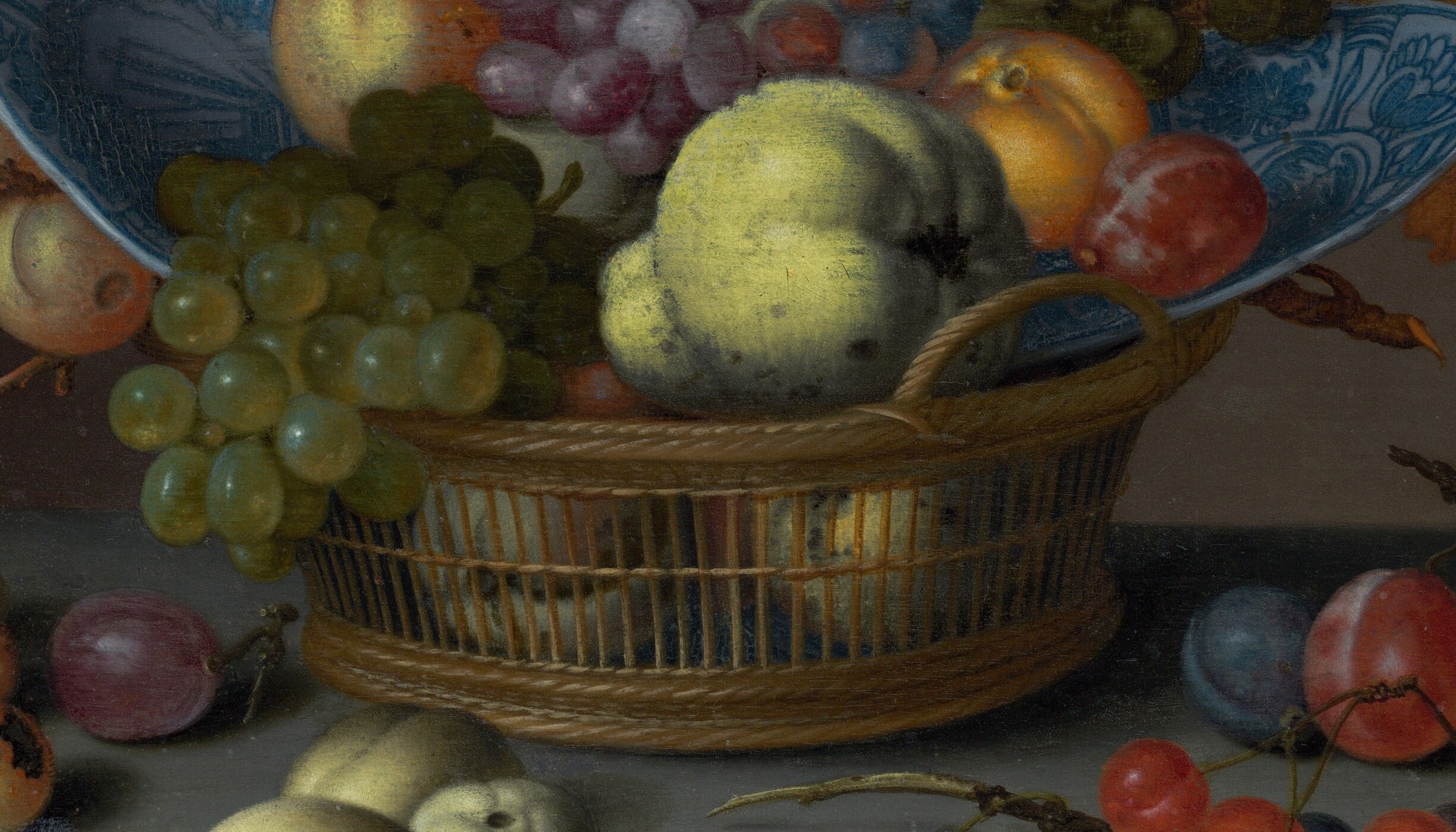 The structural anchor of the composition; its tight basketweave texture rewards close inspection and shows van der Ast's technical range beyond soft fruit rendering.