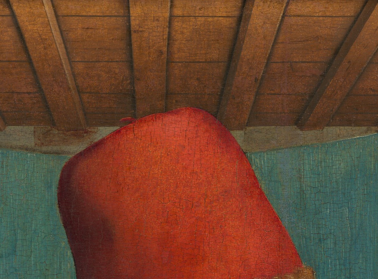 Vivid crimson biretta-style cap anchors the composition; the saturated red against the teal wall is the painting's single most arresting colour note and signals urban bourgeois fashion c. 1490