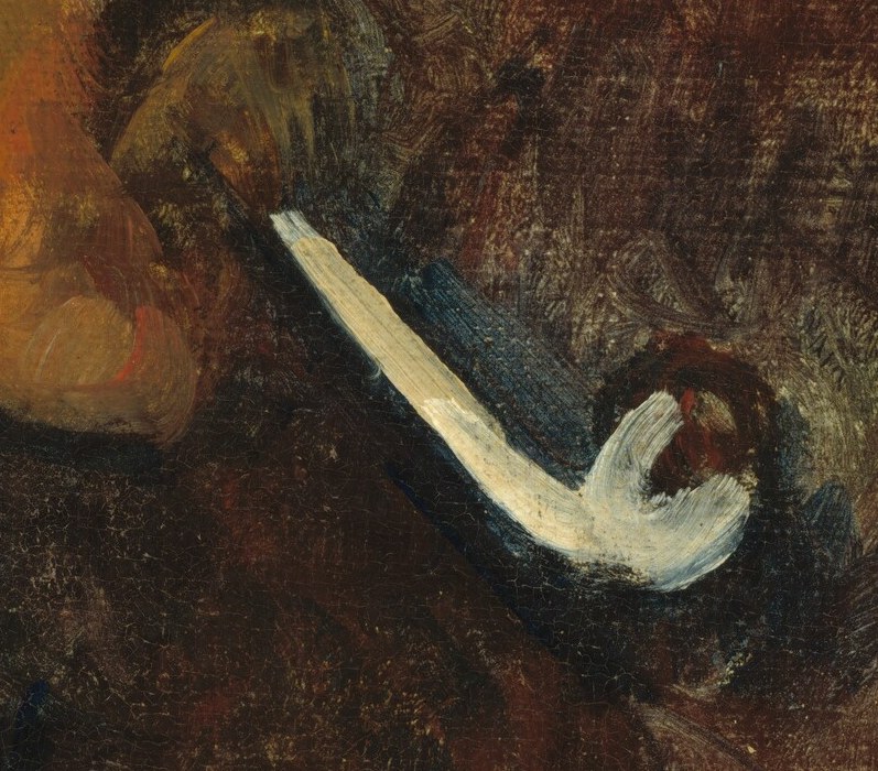 His pipe suggests a quiet moment, a daily habit.