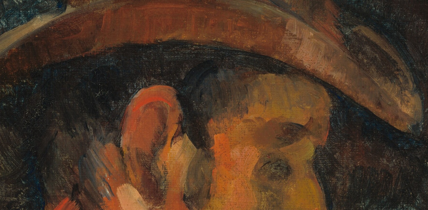 Notice the deep shadow under his hat, adding mystery.