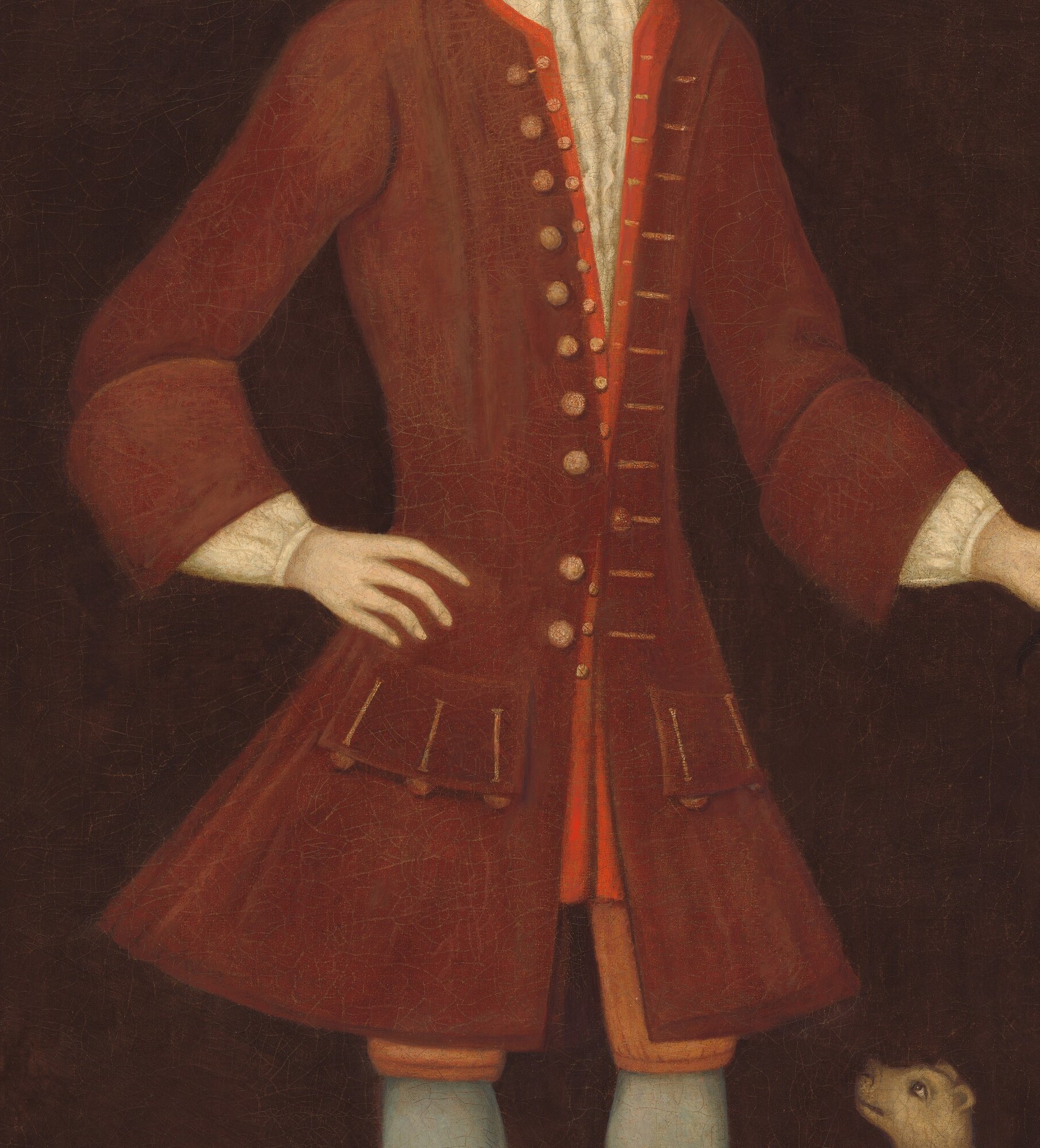 But his red coat and ruffled collar speak to his high status.