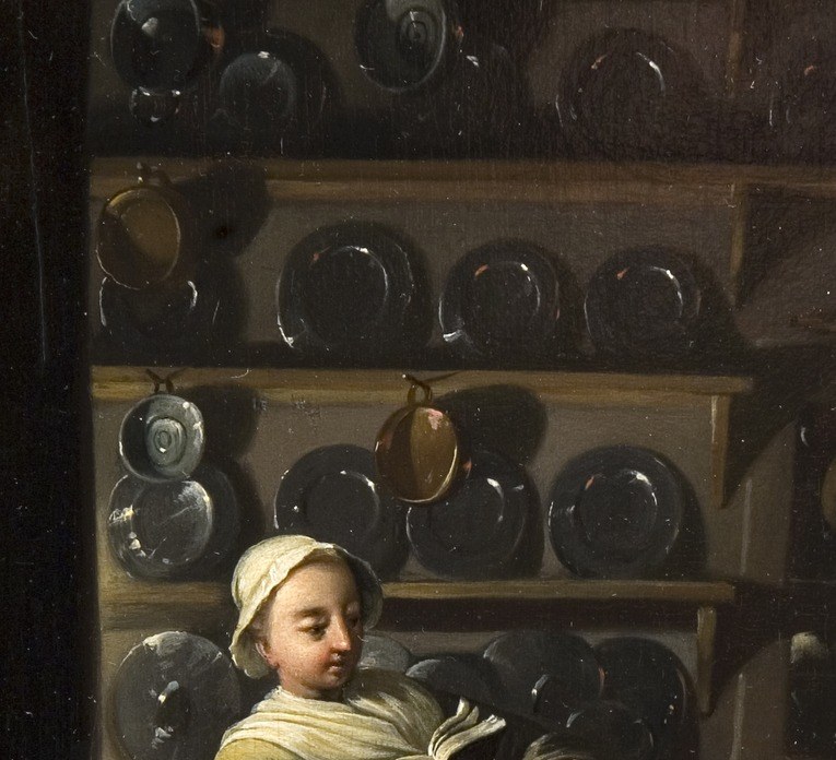 All around her, the tools of her daily labor gleam.