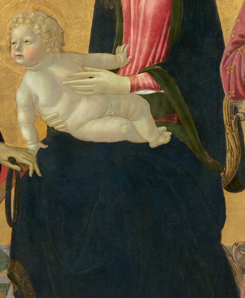 The squirming, animate pose breaks the hieratic stillness of the composition and invites the viewer to read life and vulnerability into a devotional formula.