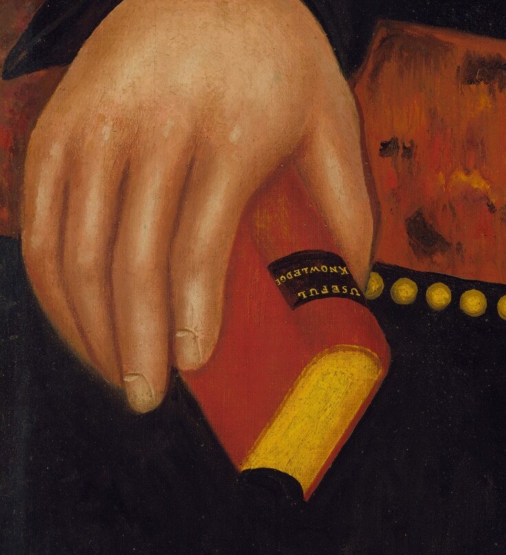 He holds a distinctive red object, perhaps a ledger or book.
