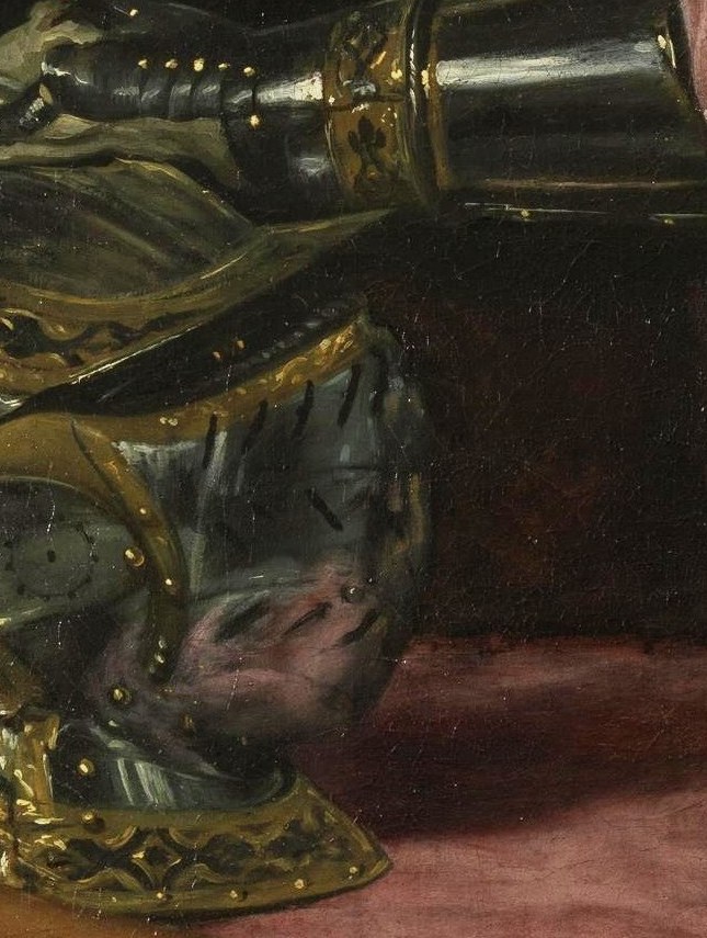 The helmet on the table signifies his role.