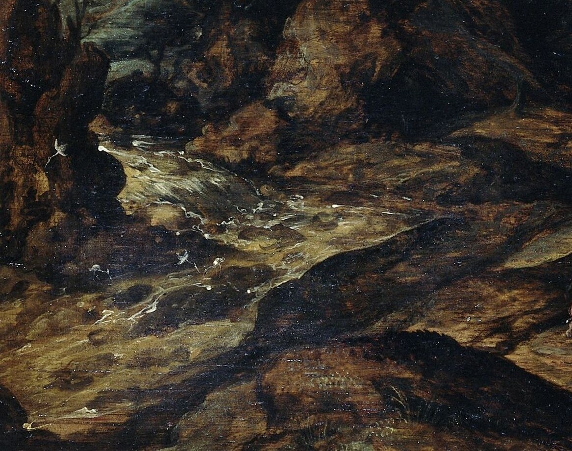 Notice the deep, textured rocks in the foreground.