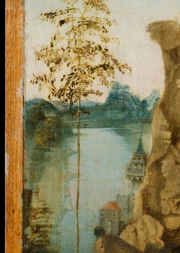 Past the river, a building stands alone on the horizon.