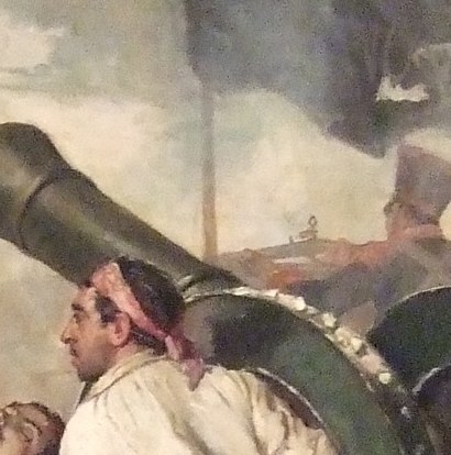 A tattered flag still flies in the background.