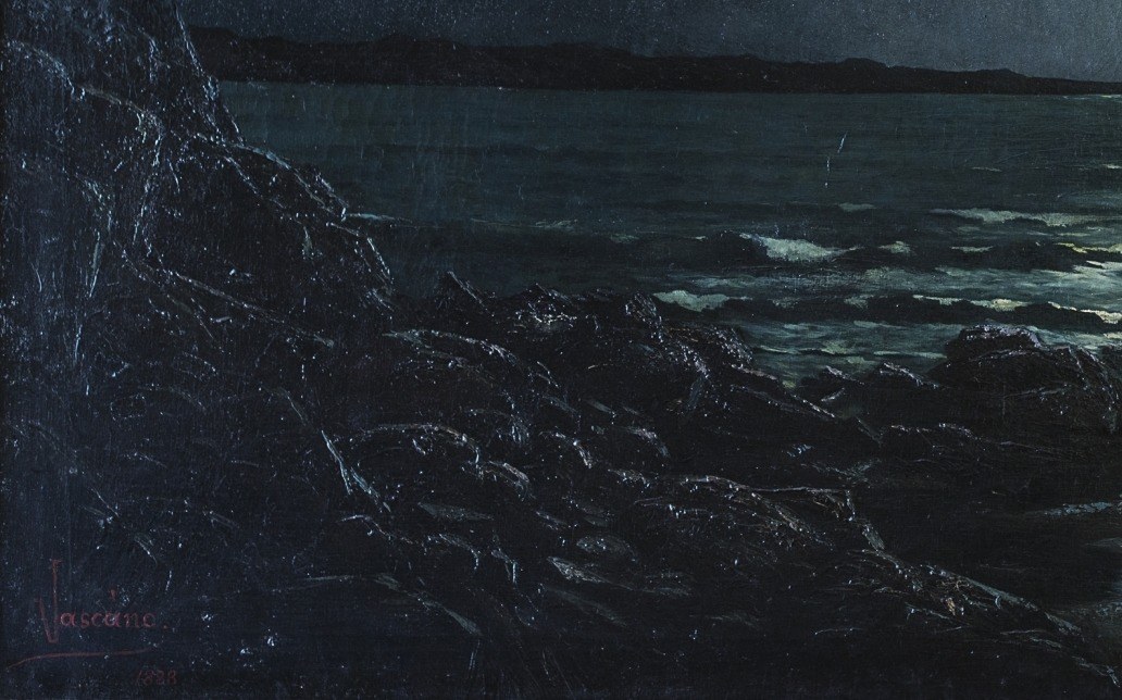 The dark, textured rocks provide a strong contrast to the illuminated water and sky.