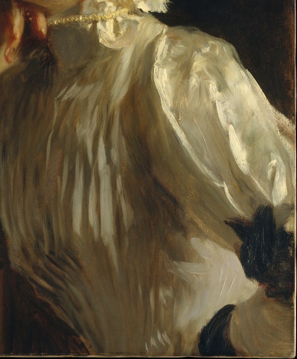 The white dress seems to glow with light.