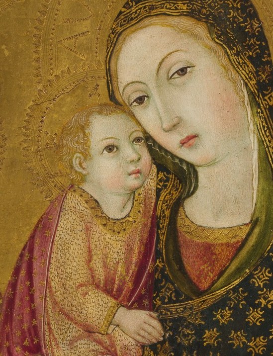The Christ Child reaches for her face with open hands.