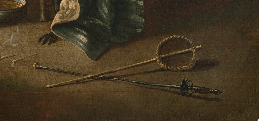 The tools of the trade are scattered carelessly on the floor.