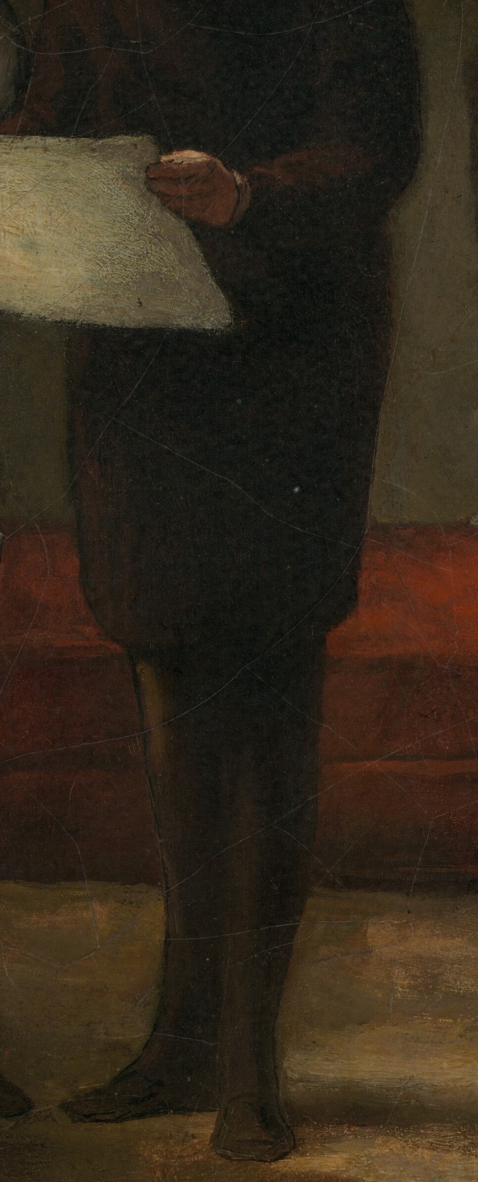 The heavy fabric and dark color suggest a formal or scholarly attire, adding to his gravitas.