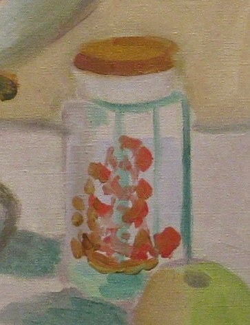 Look closer at the jar with candies.