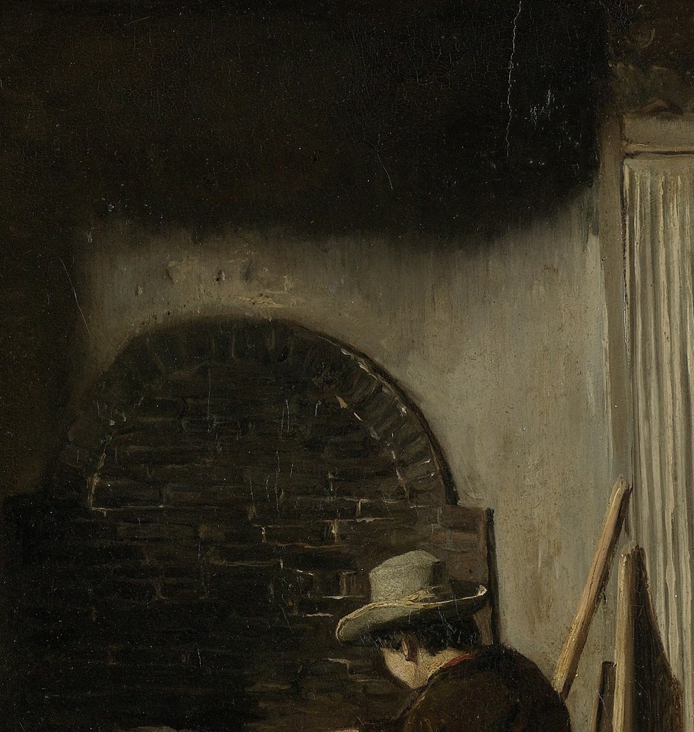 Now look at the dark fireplace behind him.