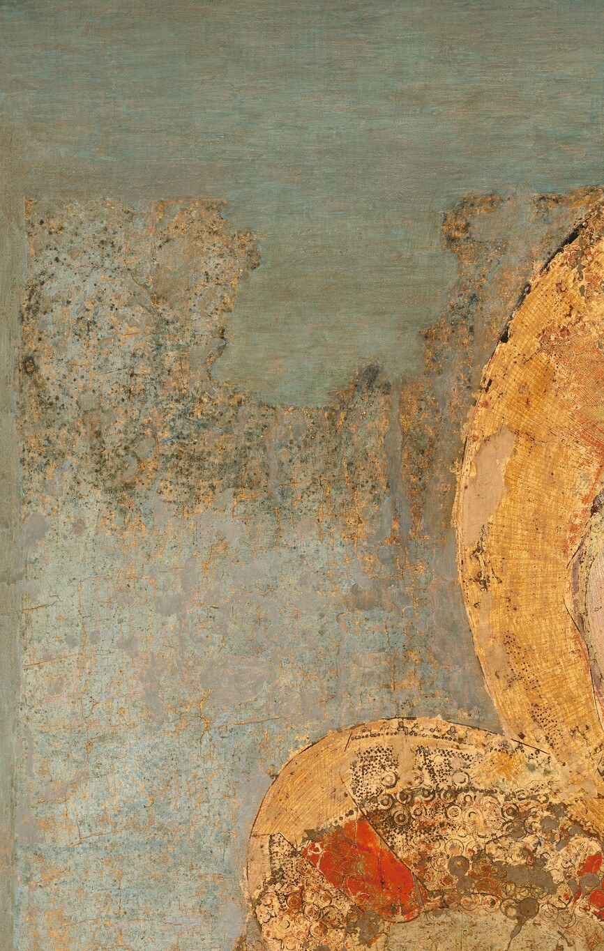 The tempera is flaking off the wood beneath.