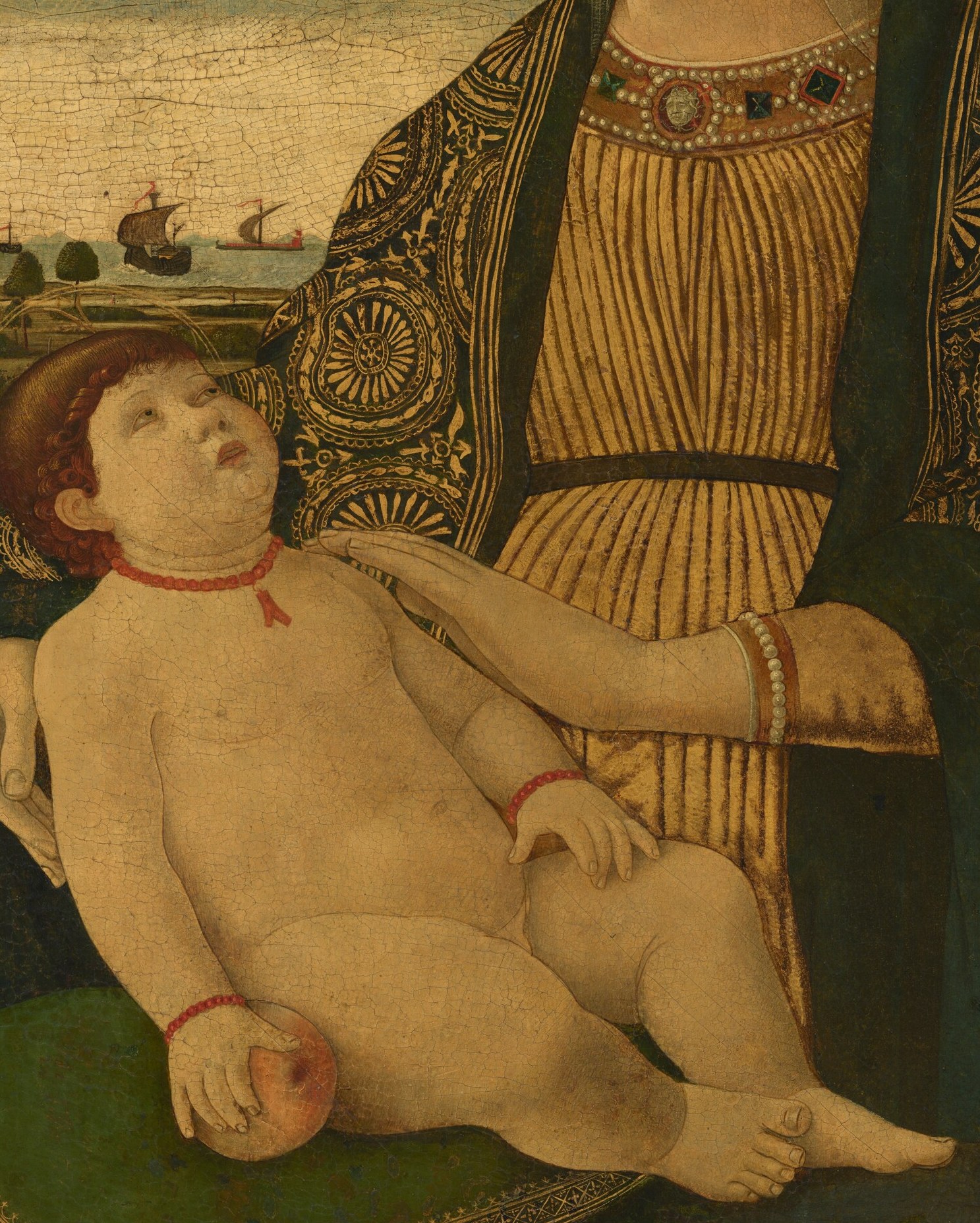 The nudity is a deliberate theological assertion of Christ's full humanity; the rounded, naturalistic infant form shows Benaglio absorbing Mantegna-era figure modeling.