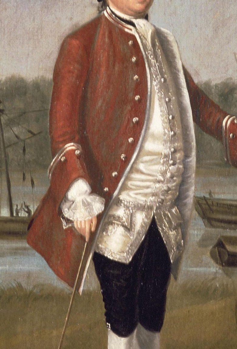 His vibrant red coat and lace cuff signal his wealth.