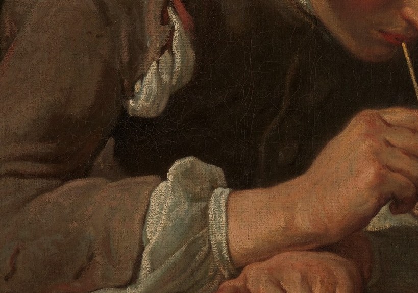 The mechanical link between breath and bubble; the tension in the fingers reveals effort hidden by apparent ease.
