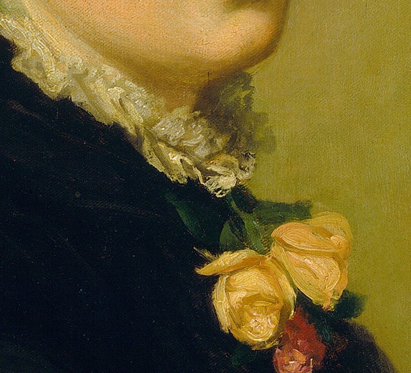 She wears a yellow rose, symbolizing friendship or new beginnings.
