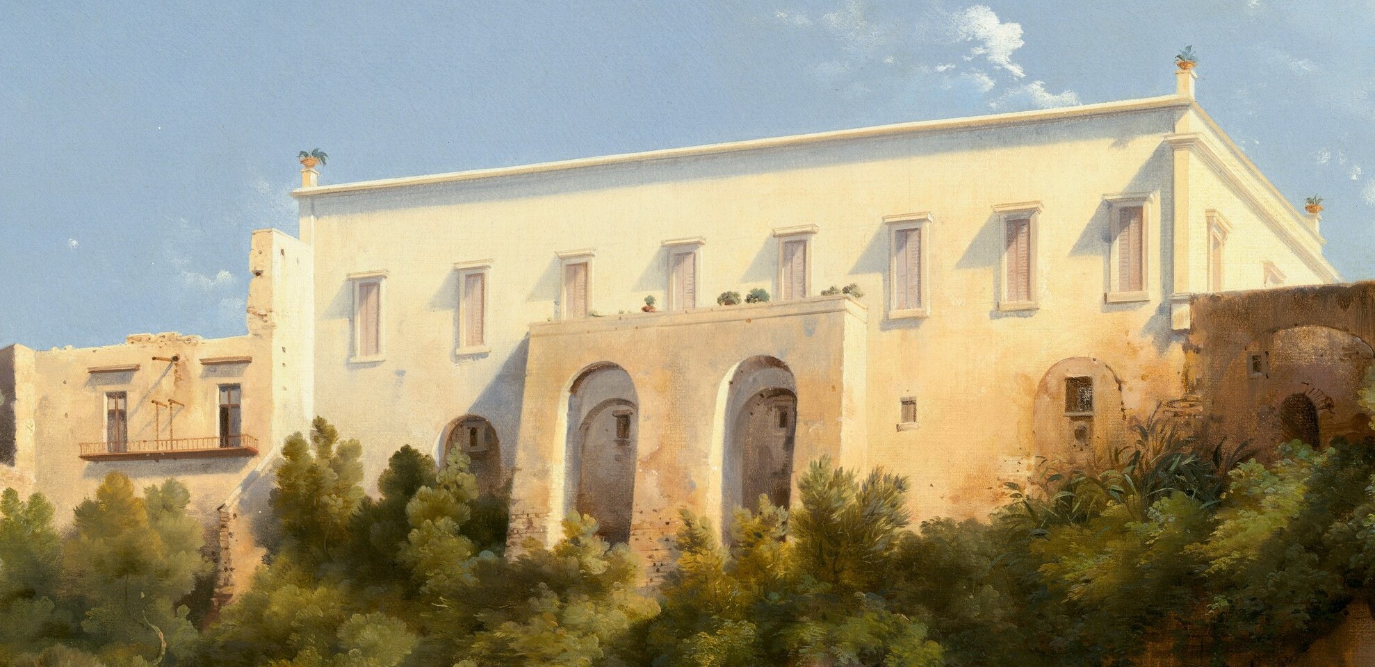 A white villa commands the cliff. Wealth in the sun.
