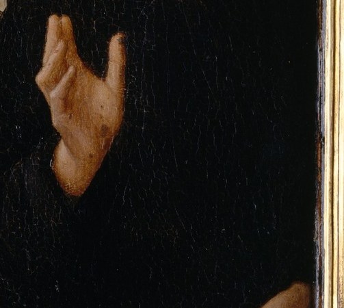 Christ's hands are raised in farewell.