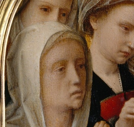 Mary turns away, her grief palpable.