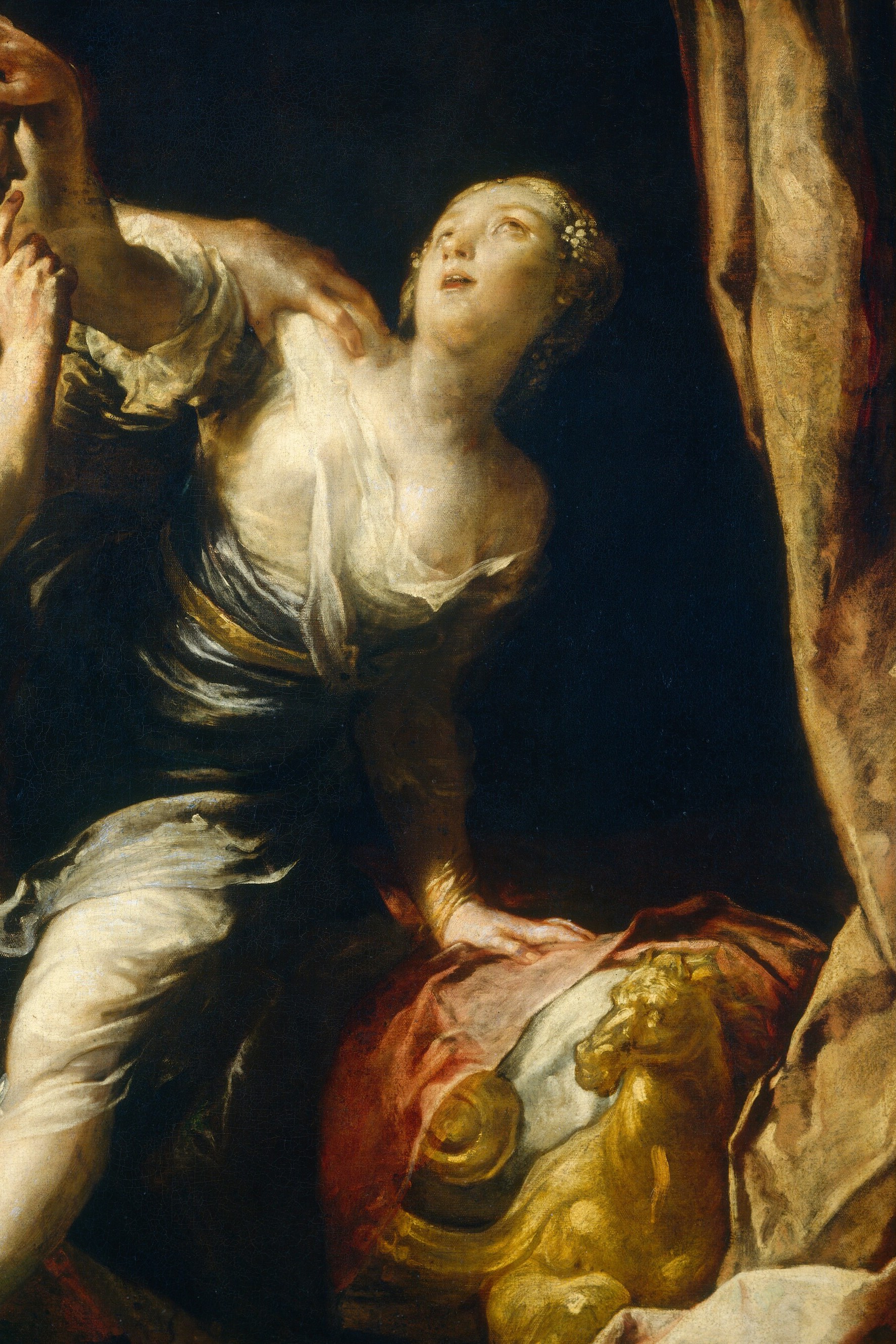 A white chemise, pulled from her shoulder.