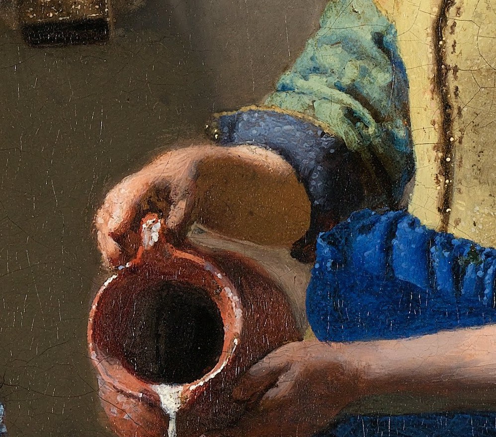The supporting hand contrasts with the pouring hand , one controls, one releases , a quiet visual grammar of domestic care