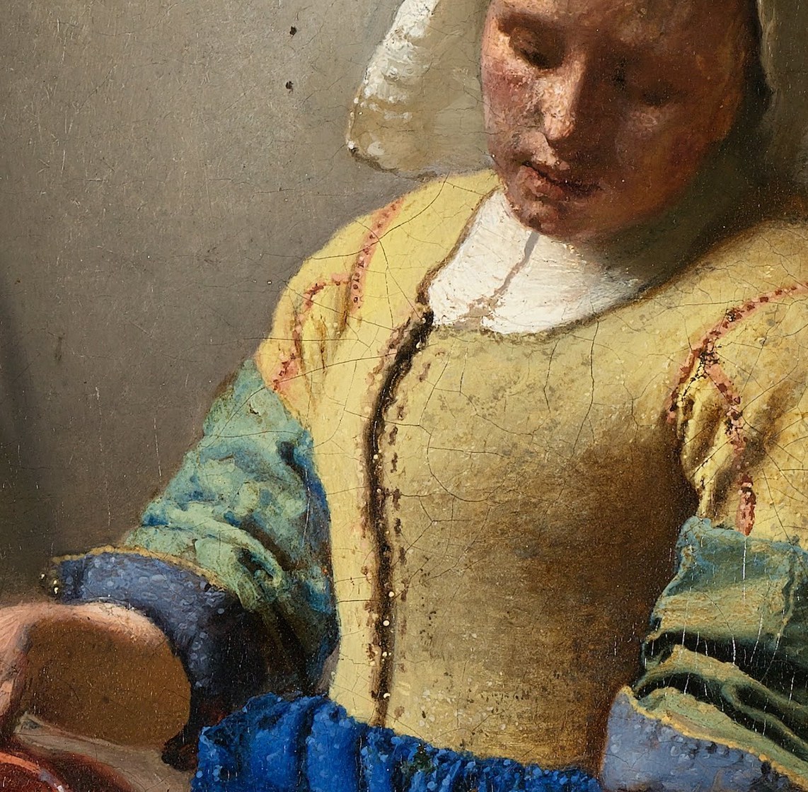 The pour is the painting's central action; Vermeer renders the ceramic texture and the arc of the milk stream with forensic precision , the stream itself is the most technically daring mark in the composition