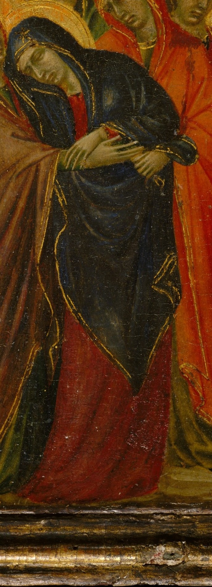 John the Evangelist wears it too, linking disciple to divine sacrifice.