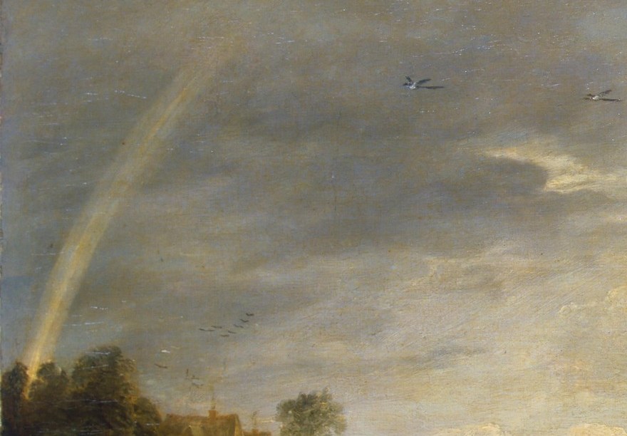 A faint rainbow arcs over the village.