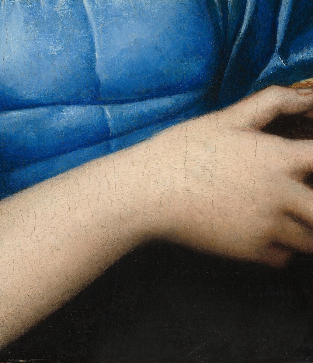 She holds an oil lamp, signifying a 'Wise Virgin'.