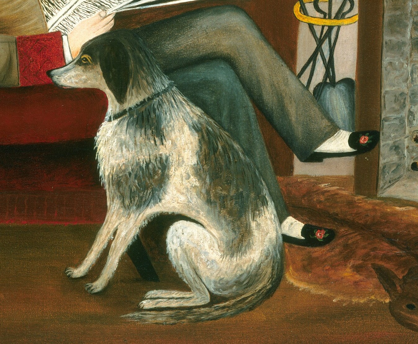 His dog waits, patient as the fire burns low.
