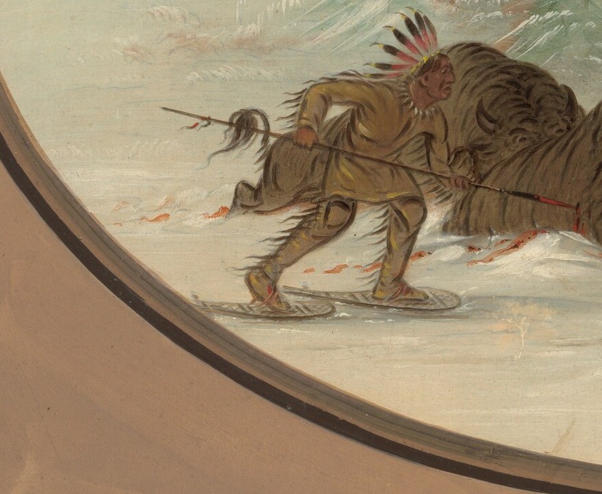 His determined posture and the snowshoes suggest a skilled hunter navigating a harsh winter environment.