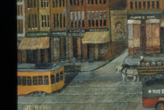 Yellow streetcars bracket the street like theater curtains.