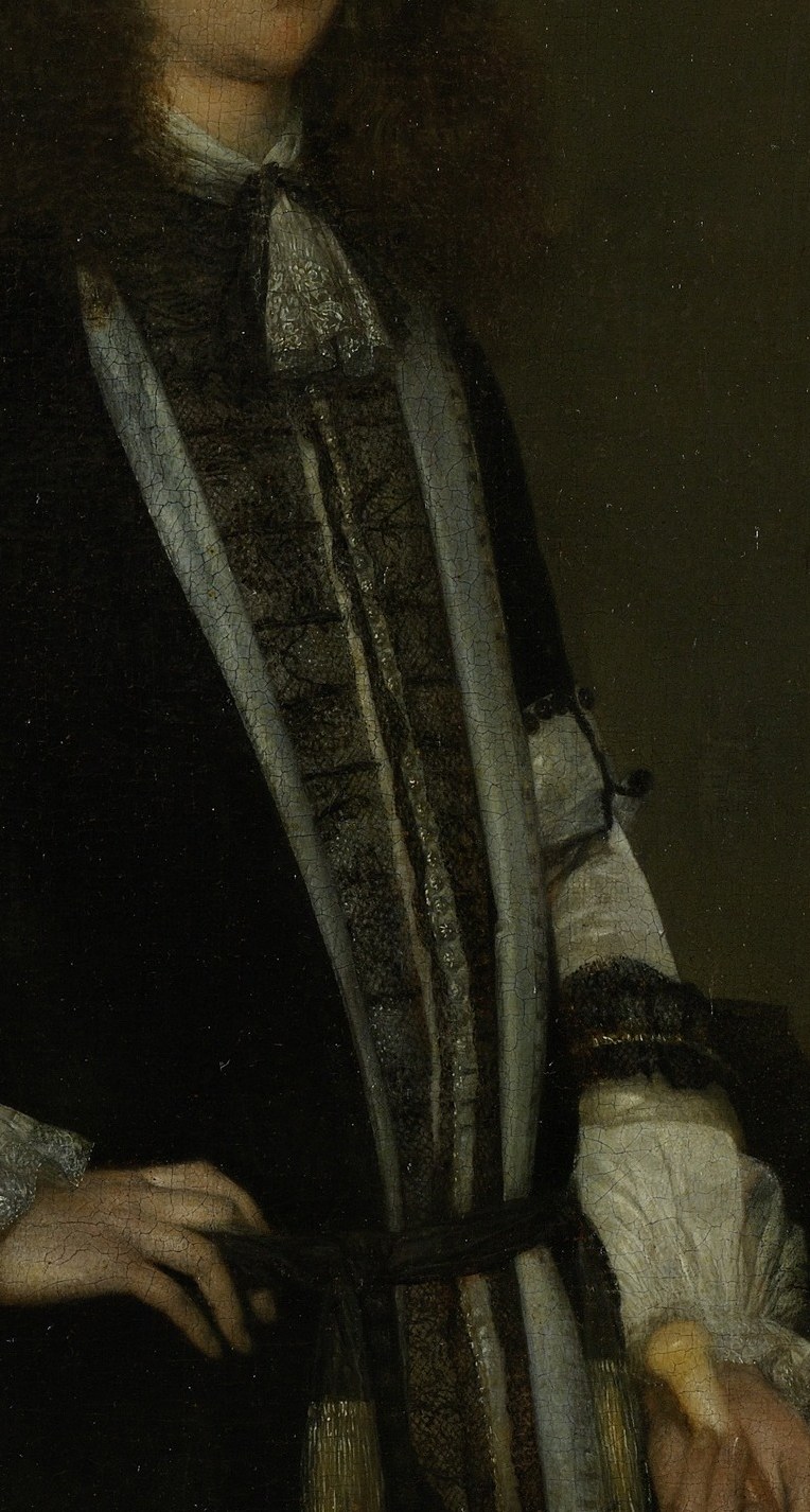 The rich fabric and intricate lace suggest wealth and social standing.